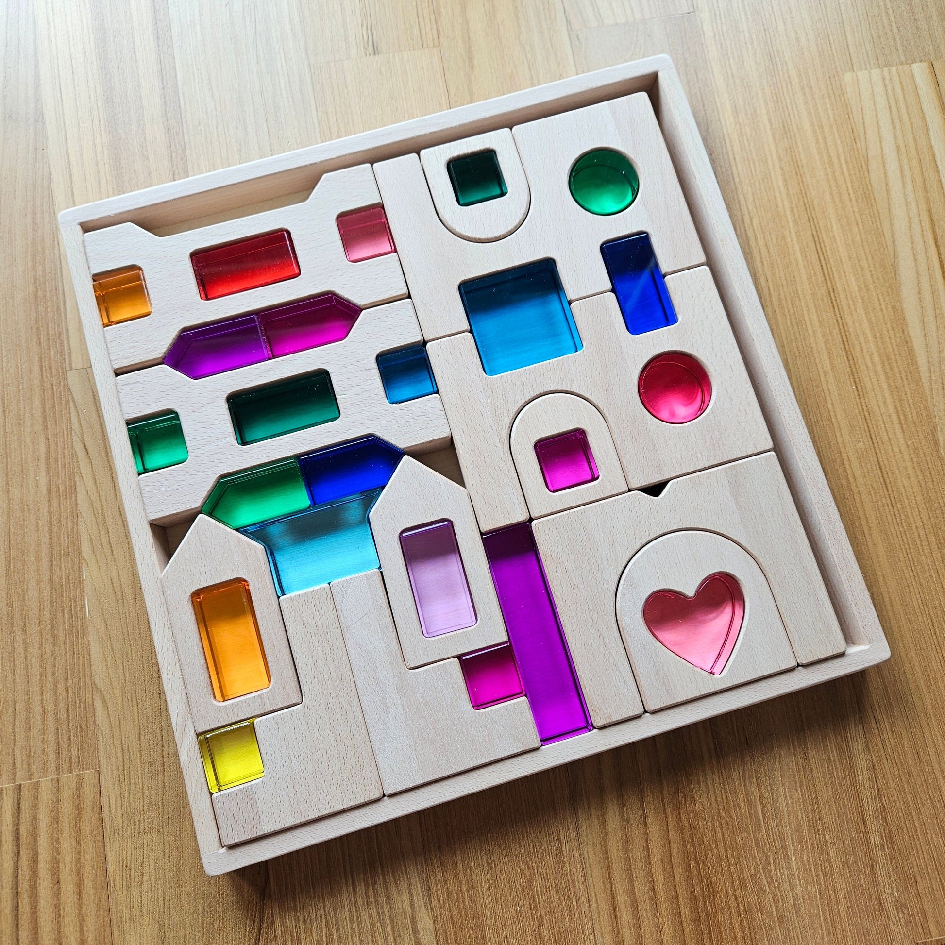 Heart of the Lucite Kingdom set with lucite pieces with beechwood castle blocks in an engraved tray